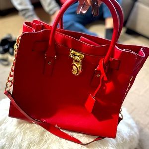 Michael kors red with gold lock and key
